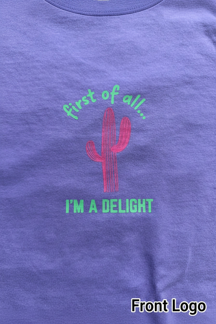 Violet fabric with pink cactus design and text on a violet background